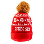 Keep your pup cozy in style with the Haute Diggity Dog Apres Ski Collection: a red knit hat featuring white snowflake and zigzag patterns, a brown pom-pom on top, and “APRÈS SKI” embroidered on the front brim—a charming accessory that pairs perfectly with ski-themed dog toys or other wintery chew toys for your furry friend.