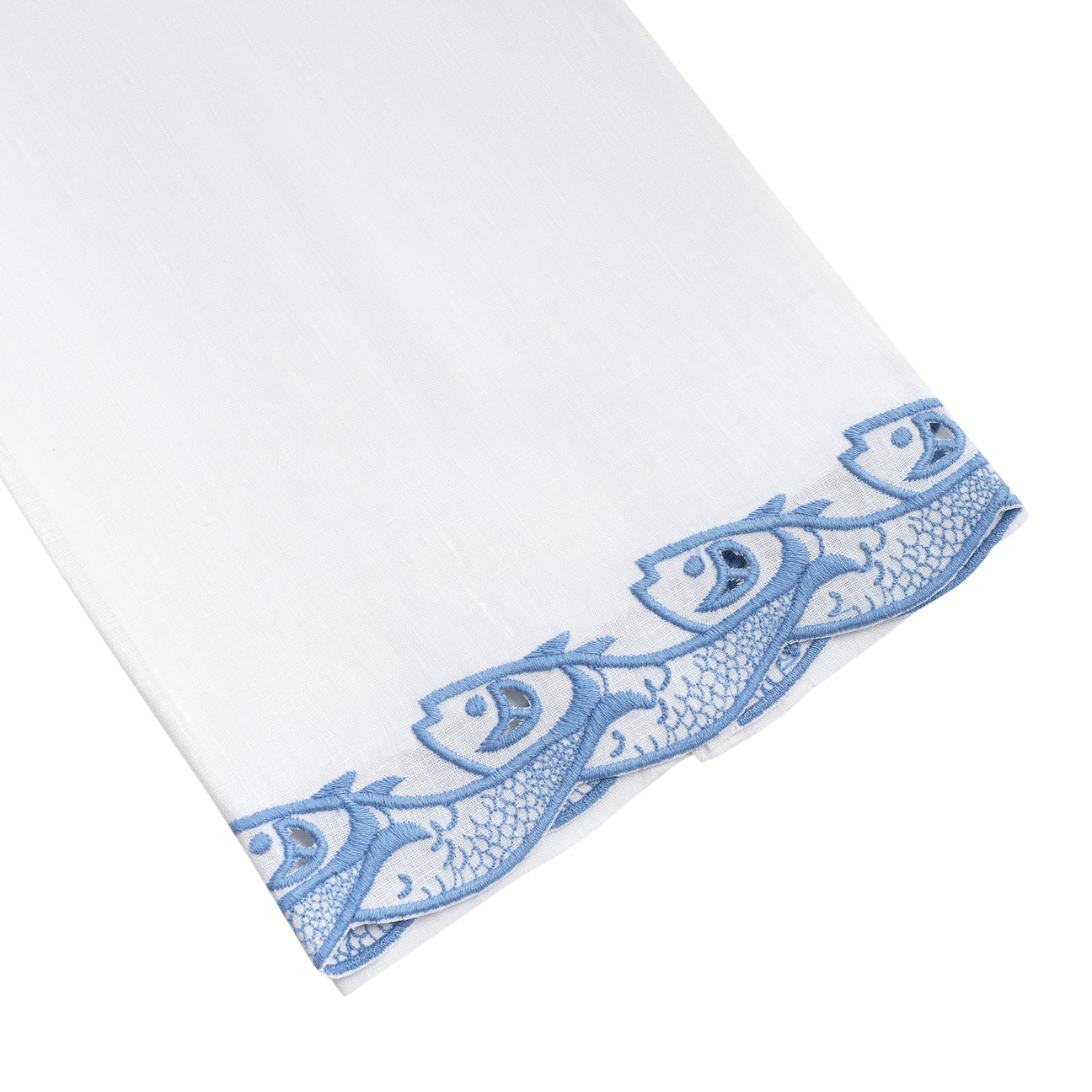 The Scrollfish Bath Collection tissue box cover by Haute Home features white Italian linen with a dark China blue hand-embroidered fish border.