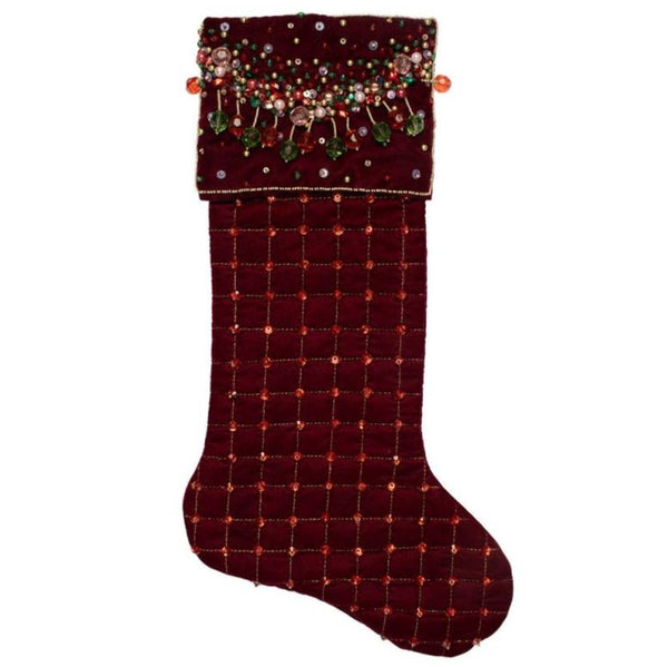 The Kim Seybert Orion Stocking, featuring burgundy velvet, a gold beaded pattern, and hand-stitched gemstones, brings an elegant touch to your holiday decor.