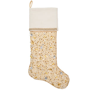 The Kim Seybert Gilded Spray Gold and Crystal Stocking features gold and silver beads and sequins on champagne fabric with a plain white cuff and a hanging loop—an elegant holiday accent for your mantel.