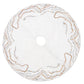 Kim Seybert Gilt Wave tree skirt in white, featuring metallic gold and silver wave patterns embellished with beads and sequins.