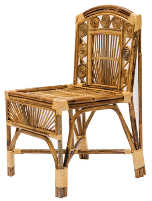 The Robinson Chair from the Varnish Collection is crafted from bamboo and wicker, showcasing decorative spiral and fan patterns on the backrest and seat.
