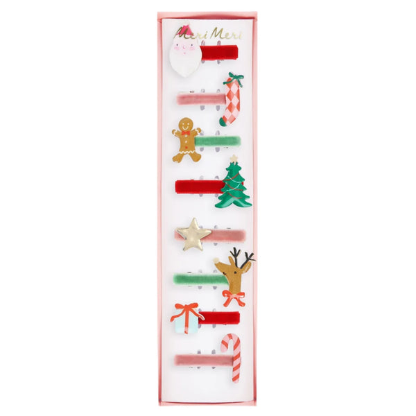 The Meri Meri Jolly Christmas Hair Clips set, from the brand Meri Meri, includes eight delightfully festive designs such as Santa, candy canes, a gingerbread man, a Christmas tree, stars, and a reindeer. These clips make excellent stocking fillers and come beautifully arranged in a rectangular box.