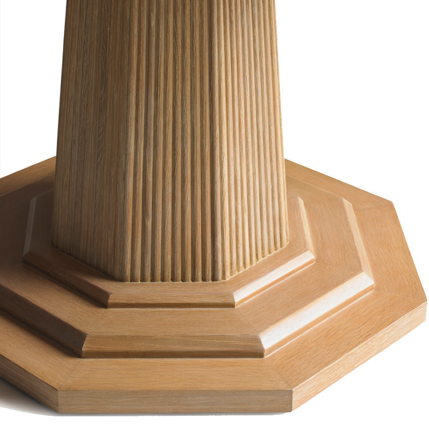 Close-up of the Haven Dining Table’s octagonal pedestal base by Bunny Williams, featuring vertical grooves and layered geometric detailing—perfect for a large or elegant cerused oak dining space.