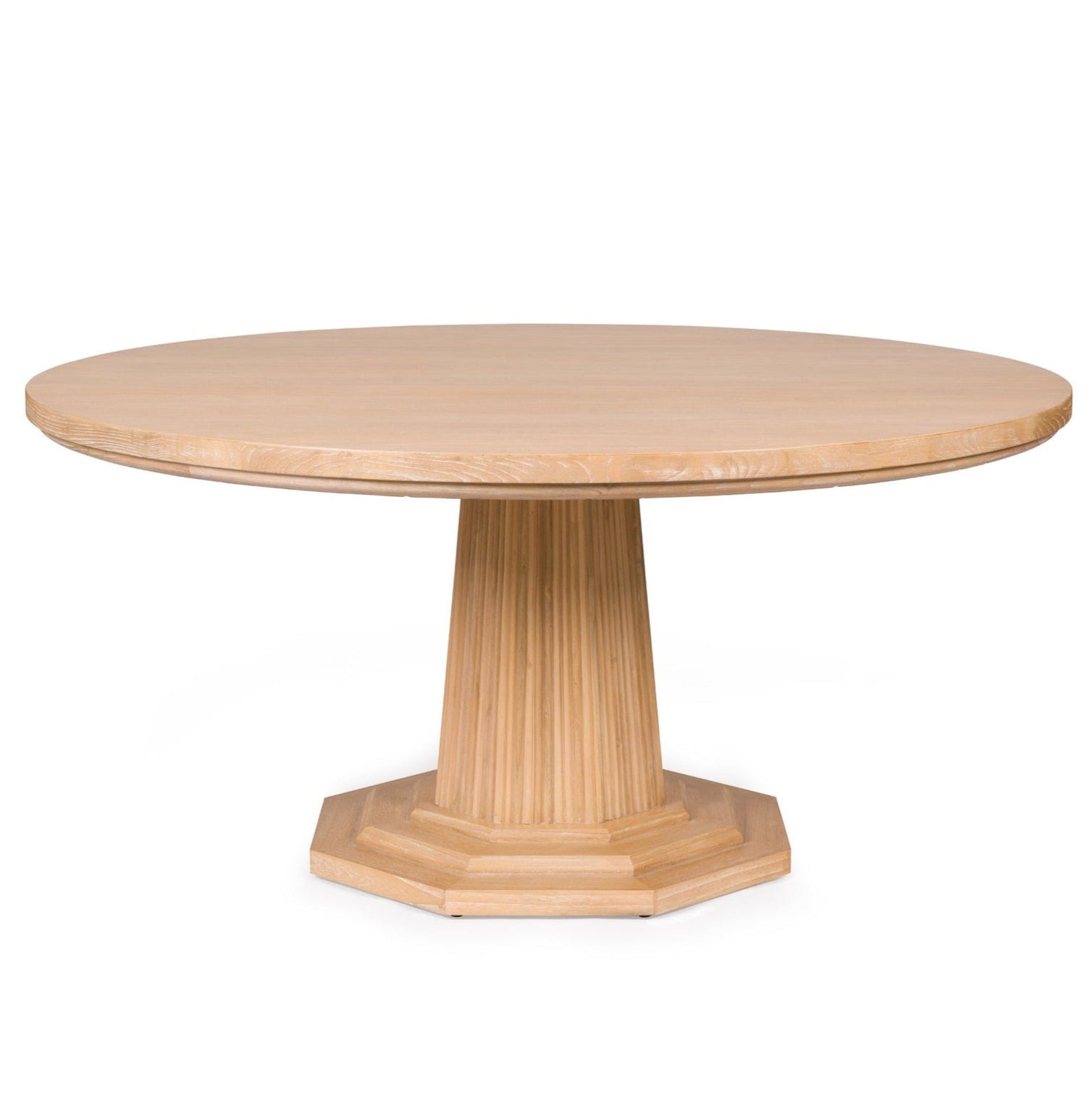 The Haven Dining Table by Bunny Williams features a large cerused oak round top, fluted pedestal base, and an octagonal platform, shown against a white background.