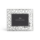 The Michael Aram Heart Frame, from the Heart Collection, is a rectangular silver picture frame featuring an open heart pattern border and displays a placeholder card labeled "Michael Aram.