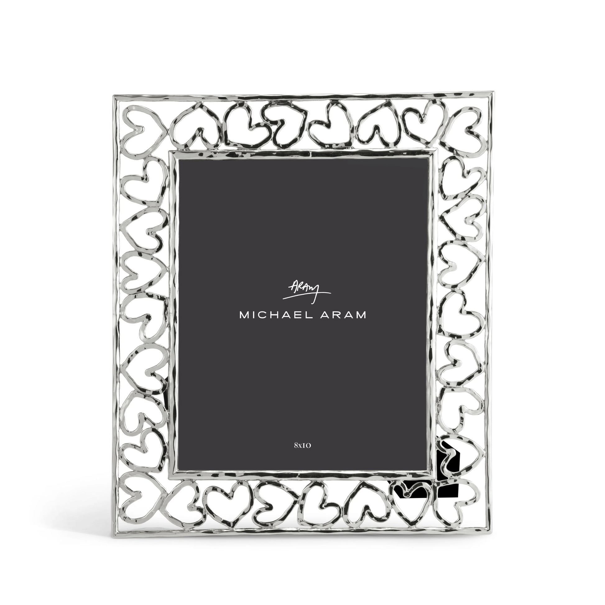 The Michael Aram Heart Frame features a silver border of interlocking, hand-forged hearts as a symbol of love and includes a "Michael Aram" placeholder card at its center.