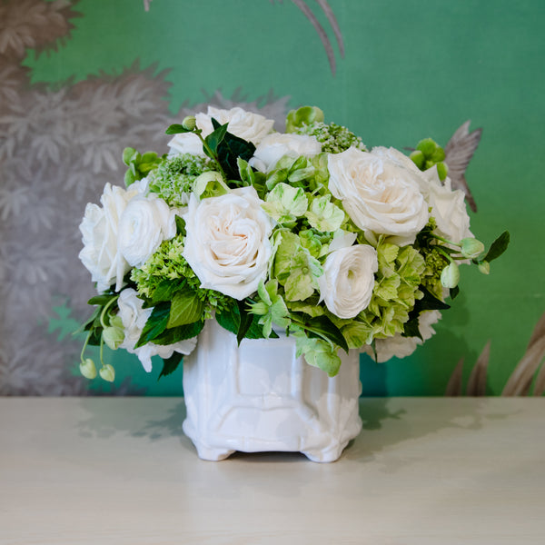 A Live Classic Floral Arrangement with green and white flowers in a Chinoiserie vase is a versatile choice for interior design from Hive Floral Studio.