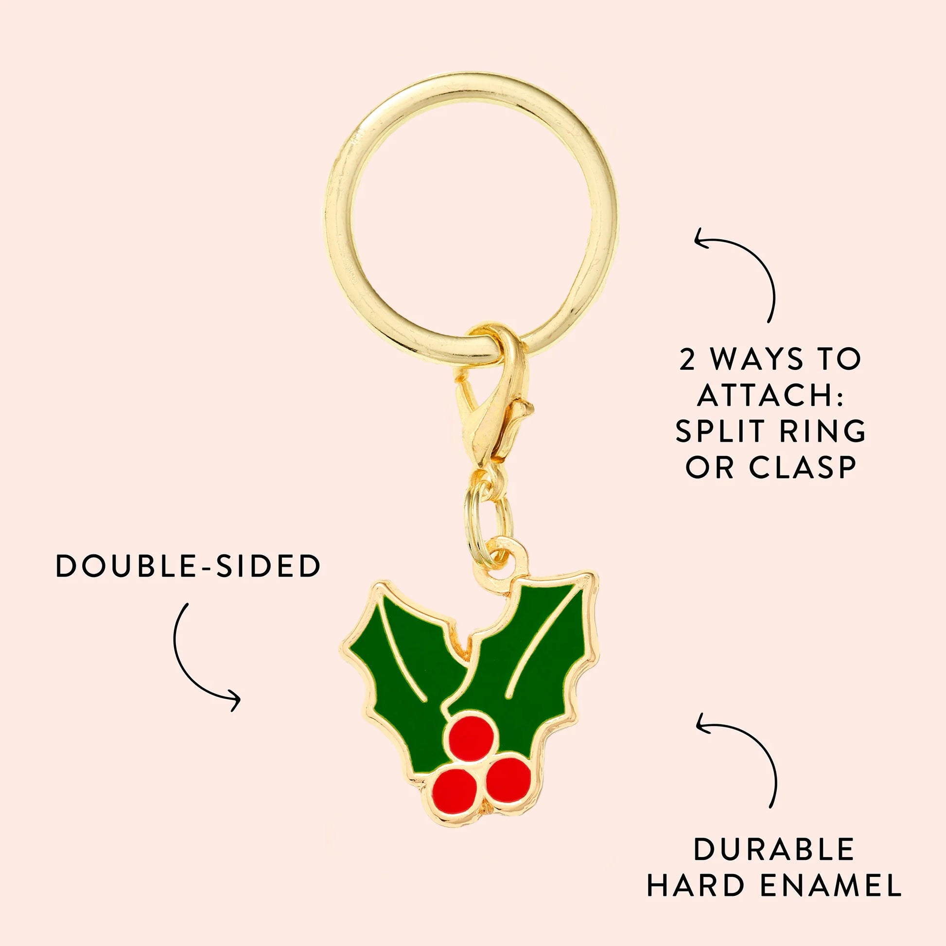 Foggy Dog’s Holly Collar Charm is a gold keychain with a double-sided holly and red berry design, made from durable hard enamel. Includes a split ring and clasp—perfect as a festive pet or holiday collar accessory.