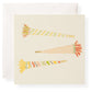 The Karen Adams Make A Wish Gift Enclosures feature three illustrated party blowers with colorful patterns, gold foil accents, and fringe on a cream background, paired with a white envelope.
