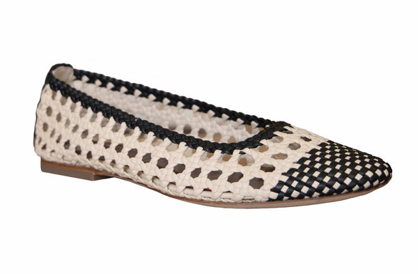 A Staud Nell Crochet Ballerina flat shoe for women, featuring a black and white pattern.