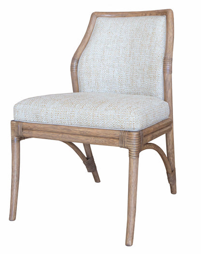 A Lantana Side Chair, Mushroom by McGuire with a cushioned seat and backrest upholstered in a light, textured fabric features furniture dimensions of 23"D and 21.25"W for a perfect fit in any space.