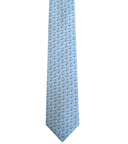 A light blue, handcrafted Robert Jensen Golf Tie, Blue adorned with a repeated pattern of small, stylized sharks.