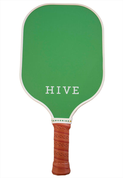 A Tangerine x Hive Custom Pickleball Paddle with a lightweight design and the word "HIVE" printed in white on the fiberglass surface. The handle is wrapped in a brown grip with the word "TANGERINE" inscribed near the base.