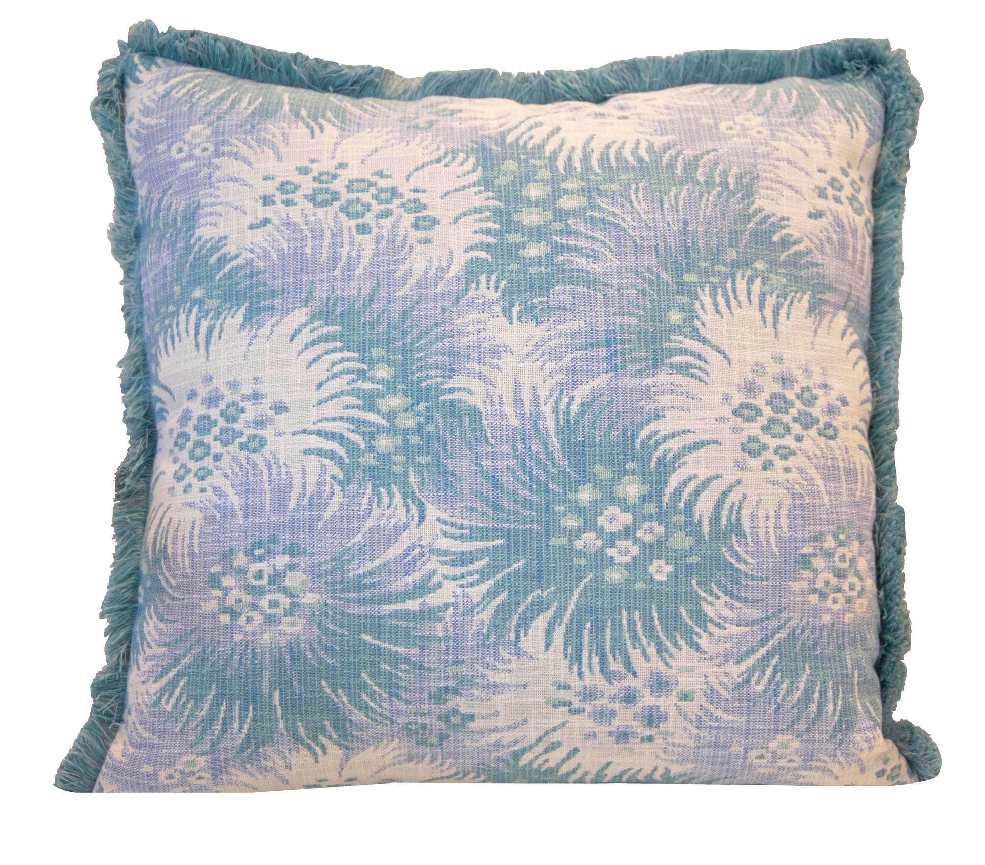 The Bimini Sea Glass Outdoor Pillow by Hive Custom Pillows features a blue and white floral pattern with blue fringe, shown on a white background. This 22x22 square pillow adds stylish comfort to your patio or garden furniture.