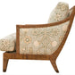 Side view of the St. Germain Lounge Chair by McGuire Furniture, showcasing a luxurious upholstered frame with light green and beige floral-patterned fabric inspired by 1940s French design on the seat, backrest, and side panel.