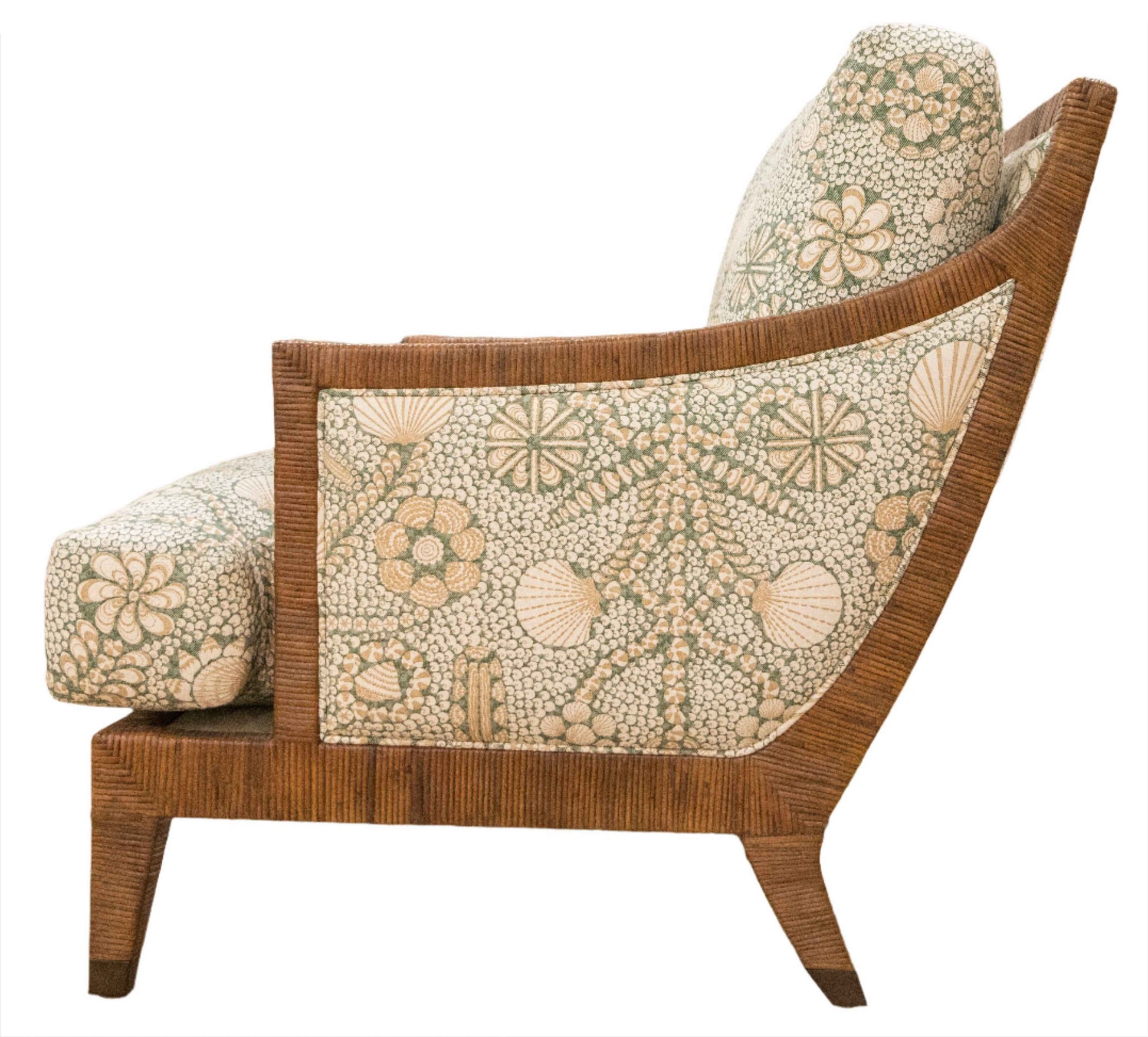 Side view of the St. Germain Lounge Chair by McGuire Furniture, showcasing a luxurious upholstered frame with light green and beige floral-patterned fabric inspired by 1940s French design on the seat, backrest, and side panel.