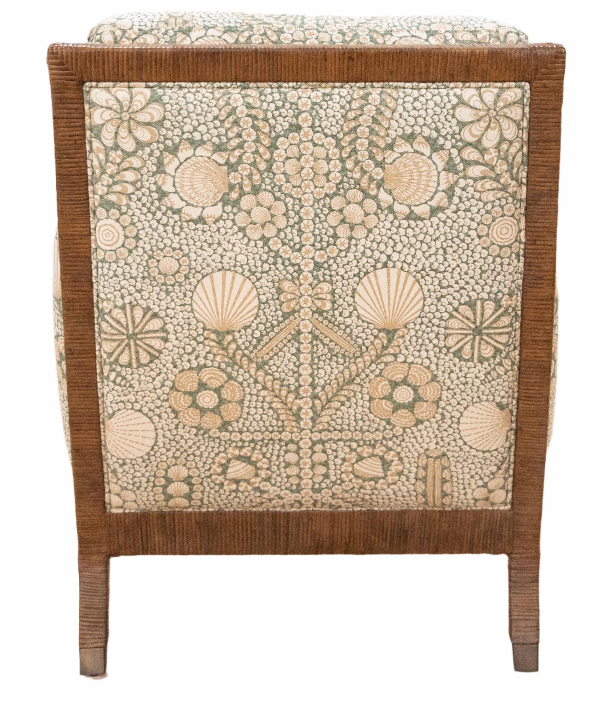 The St. Germain Lounge Chair by McGuire Furniture features a wooden frame and an upholstered backrest in beige and green floral and shell patterns, inspired by 1940s French design for timeless appeal.