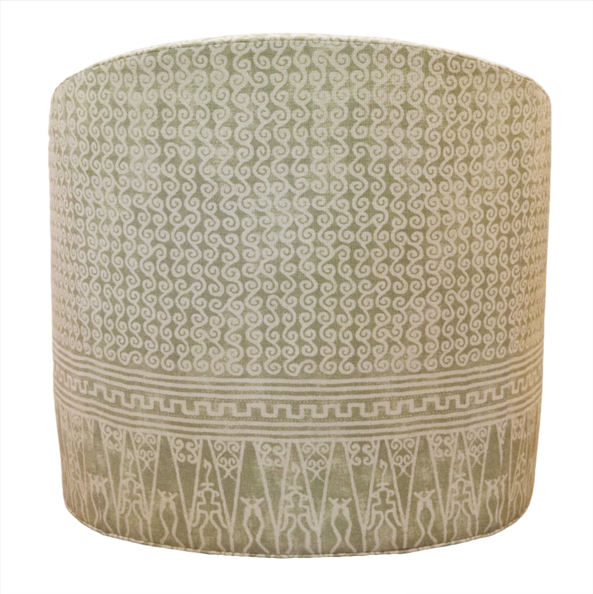 The Baker Dima Swivel Chair features a green and white geometric swirl pattern, providing comfortable seating and shown against a white background.