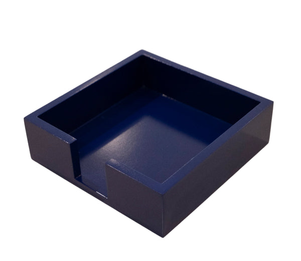 A Black Ink Blue Lacquer Notepad Holder, Small, featuring a square-shaped design with an open-top and a cut-out on one side, perfect for holding desk trays or a 5.5" pad size notepad gift, placed on a light-colored surface.