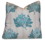 The Lucknow Seafoam Pillow by Hive Custom Pillows is a handmade, down-filled square pillow with a white background, blue floral and green leafy patterns accented with gold zigzag lines—adding sophisticated comfort and style to any space.