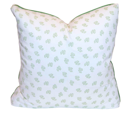 The Dolly Flower Lettuce Green Pillow by Associated Design is a handmade, down-filled square white pillow with a green leaf pattern and green piping, crafted in the USA and shown against a white background.