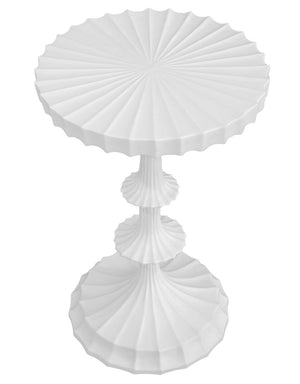The Priscilla Side Table by Oly features a white sculpted fluted design with a round, tiered top and base, symmetrical form, and textured radial pattern—an elegant accent for your living room.