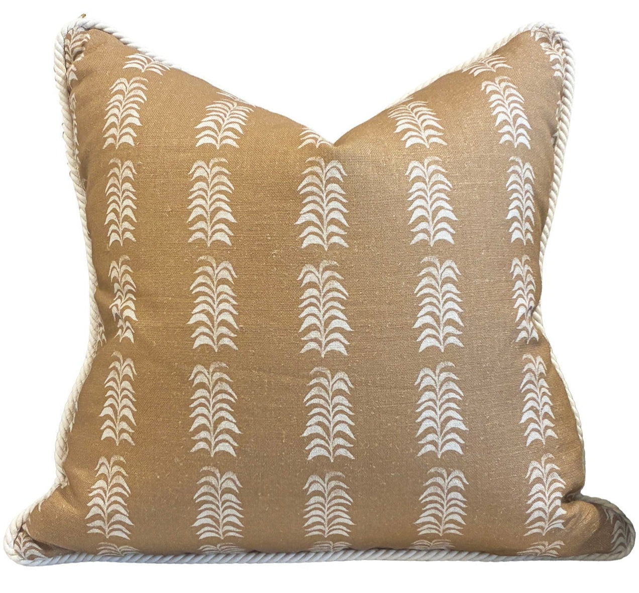 The Petite Frond Pillow by Hive Custom Pillows is a square tan cushion with a white geometric leaf pattern and white corded edges, custom-made from premium materials and shown on a plain white background.