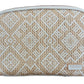 Tan and white woven zippered pouch with a geometric diamond pattern from the Paros Coconut Travel Collection by Stephanie Johnson, featuring a small label in the bottom right corner.