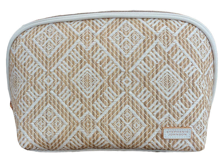 Tan and white woven zippered pouch with a geometric diamond pattern from the Paros Coconut Travel Collection by Stephanie Johnson, featuring a small label in the bottom right corner.