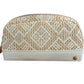 The Paros Coconut Travel Collection Mae Mini Pouch by Stephanie Johnson is beige and white with geometric patterns, a zippered top, a fabric base, and a small round metal stud on one corner.