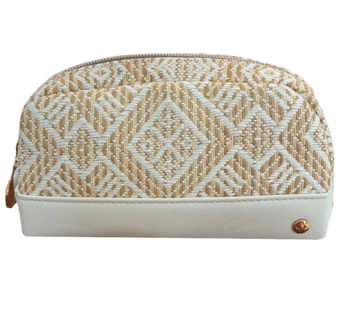 The Paros Coconut Travel Collection Mae Mini Pouch by Stephanie Johnson is beige and white with geometric patterns, a zippered top, a fabric base, and a small round metal stud on one corner.