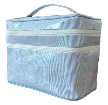 The Walker Valentine Walton Travel Case features a handle, cheerful blue and white stripes, and two white zippers.
