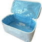 The Walker Valentine Walton Travel Case is a light blue, rectangular case with a zippered lid and smooth, waterproof lining—ideal for keeping essentials organized while traveling.