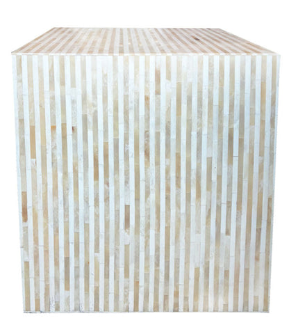 The Bojay Stripe Side Table is a large cube with vertical beige and off-white stripes, highlighting artisanal craftsmanship, shown against a white background.