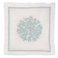 White linen napkin features a light blue embroidered coral design and matching stitched border. Pair it with Haute Home’s Sea Sponge Coaster Set for an elegant table setting.