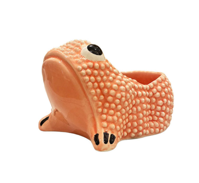 From the Jean Roger Paris Ceramic Frog Collection, this ceramic planter features a textured orange finish and a back cavity, inspired by iconic frog designs, set against a white background.
