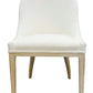 The Maurice Dining Chair by Sherrill/Mr & Mrs Howard features a white upholstered seat, curved backrest, and light wooden legs, creating a stylish and comfortable dining option for any space.
