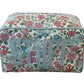 The Milan Cosmetic Case by Walker Valentine is a rectangular beauty essentials organizer featuring a floral pattern and the word "STUFF" in large letters on the front.