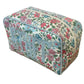 The Walker Valentine Milan Cosmetic Case is a rectangular zippered pouch with a floral pattern and “STUFF” on the side—ideal for carrying your beauty essentials when traveling.