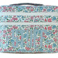 The Walton Travel Case by Walker Valentine is a rectangular organizer with a floral pattern and "STUFF" in bold on the front. Double zippers open to spacious compartments for essentials.
