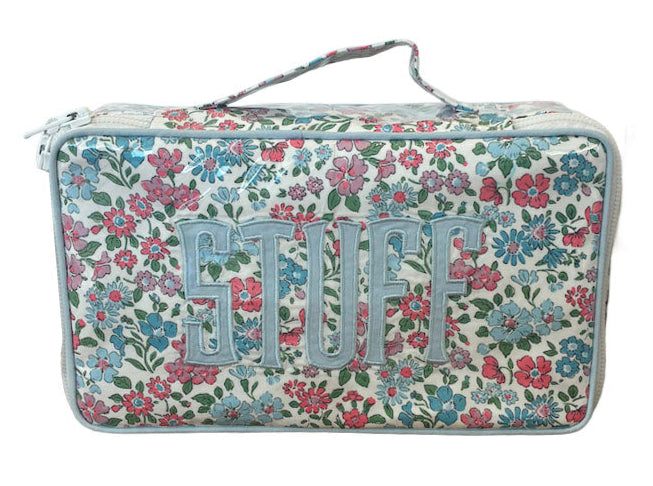The Walker Valentine Handled Brush and Makeup Case offers floral style, a handle, and brush compartments—perfect for carrying your essentials on the go.