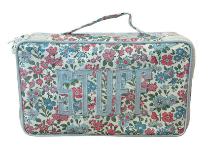 The Walker Valentine Handled Brush and Makeup Case offers floral style, a handle, and brush compartments—perfect for carrying your essentials on the go.