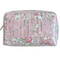 The Milan Cosmetic Case by Walker Valentine is a rectangular floral bag with "MAKE UP" in bold pink letters—ideal for organizing beauty essentials at home or while traveling.