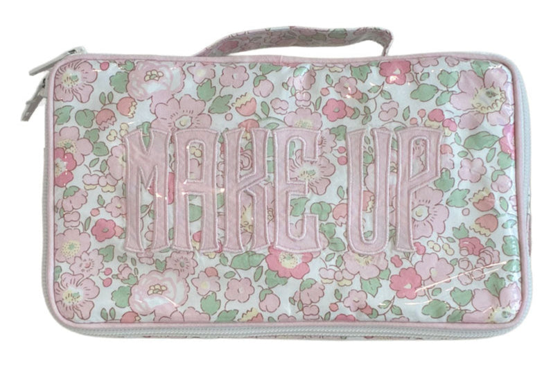 The Walker Valentine Handled Brush and Makeup Case is a rectangular bag with a floral pink, green, and white pattern and "MAKE UP" on the front—ideal as a travel case for organizing brushes and essentials.