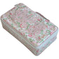 The Walker Valentine Handled Brush and Makeup Case is a rectangular floral travel case with handle and zipper, "MAKEUP" embroidered on the lid, and brush compartments for organized storage.