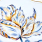 Close-up of the Botanical Treasures Salad Plate VI by Anna Weatherley, a white porcelain plate with intricate hand-painted yellow, blue, and purple floral details and a gold rim.