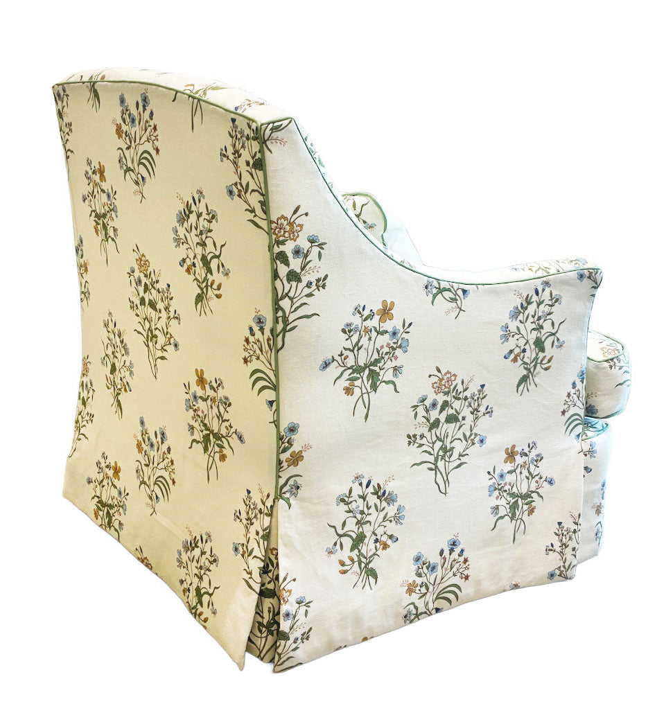 The Bowen Arm Chair in Flax & Field Flowers by Bunny Williams showcases a cream floral slipcover, displayed from the back and side against a white background.