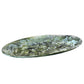 The Nashi Home Serveware Collection, Forest by Nashi Home features an elongated oval ceramic platter with a green, blue, and white marbled glaze—ideal for serving or as a striking decor accent.
