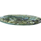 The Nashi Home Serveware Collection, Forest, features a shallow oval glass dish with a green and white marbled pattern—ideal for serving or as a striking decor accent.
